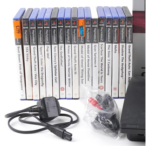 1373 - Sony PlayStation 3 and PlayStation 2 games consoles with controllers and a collection of PlayStation... 