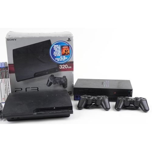 1373 - Sony PlayStation 3 and PlayStation 2 games consoles with controllers and a collection of PlayStation... 