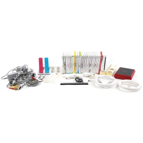 1399 - Two Nintendo Wii games consoles including Wii Mini, with controllers, accessories and a collection o... 