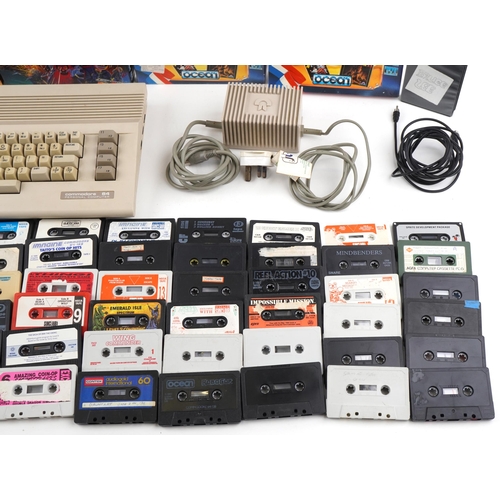 1402 - Vintage Commodore 64 personal computer, Commodore Datasette with accessories and a collection of gam... 