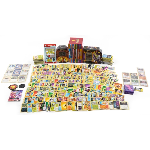 1382 - Large collection of Pokemon trade cards, some holographic, with two collector's tins and Orchard fif... 