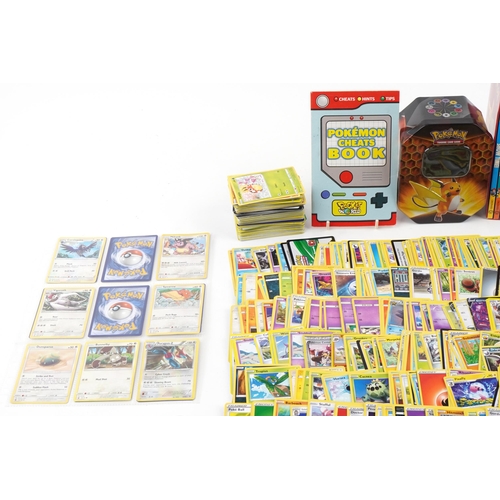 1382 - Large collection of Pokemon trade cards, some holographic, with two collector's tins and Orchard fif... 