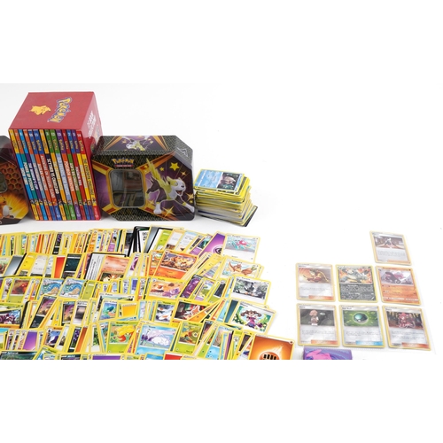 1382 - Large collection of Pokemon trade cards, some holographic, with two collector's tins and Orchard fif... 