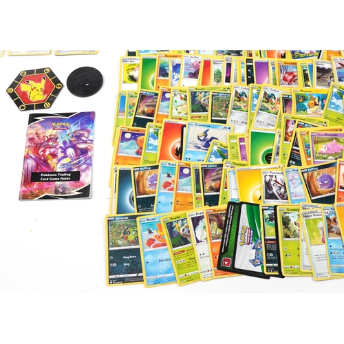 1382 - Large collection of Pokemon trade cards, some holographic, with two collector's tins and Orchard fif... 