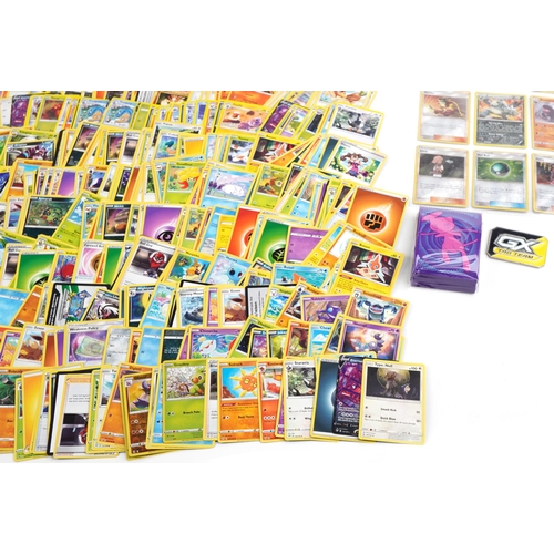 1382 - Large collection of Pokemon trade cards, some holographic, with two collector's tins and Orchard fif... 