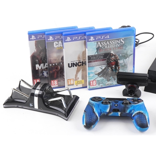 1389 - Sony PlayStation 4 games console with controllers, accessories and four games including Call of Duty... 