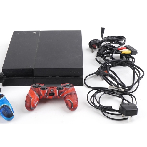 1389 - Sony PlayStation 4 games console with controllers, accessories and four games including Call of Duty... 