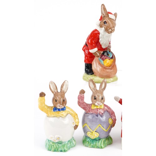 353 - Nine  Royal Doulton Bunnykins figures comprising Father Christmas Bunnykins, Santa Bunnykins, Happy ... 