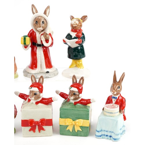 353 - Nine  Royal Doulton Bunnykins figures comprising Father Christmas Bunnykins, Santa Bunnykins, Happy ... 