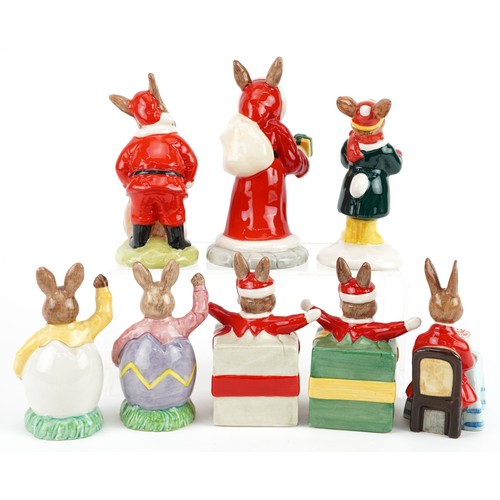 353 - Nine  Royal Doulton Bunnykins figures comprising Father Christmas Bunnykins, Santa Bunnykins, Happy ... 