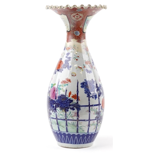 1227 - Japanese Arita porcelain vase with frilled rim hand painted with flowers, 55cm high