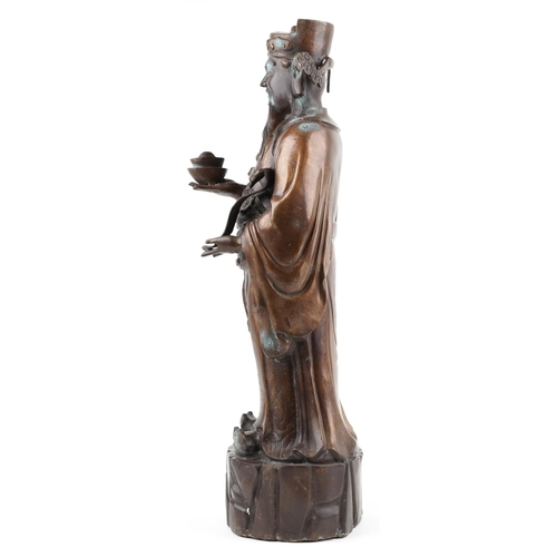 1104 - Large Chinese watered bronze figure of a standing emperor holding a ruyi sceptre, 78cm high