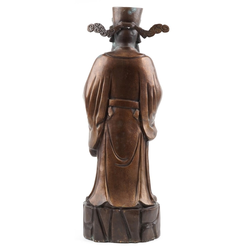 1104 - Large Chinese watered bronze figure of a standing emperor holding a ruyi sceptre, 78cm high