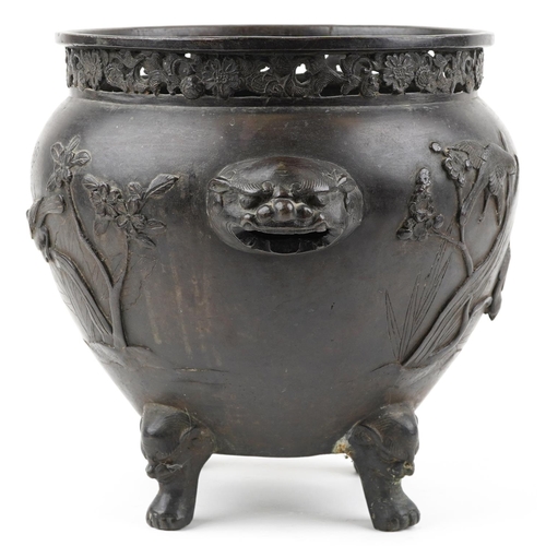 1103 - Japanese patinated bronze four footed jardiniere with pierced border and animalia handles carved in ... 