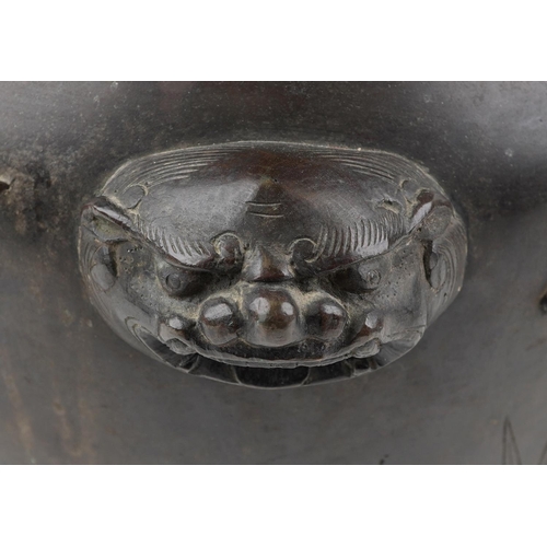 1103 - Japanese patinated bronze four footed jardiniere with pierced border and animalia handles carved in ... 