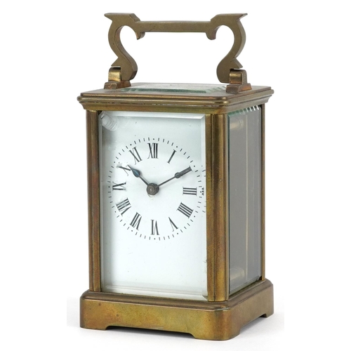 232 - French brass cased carriage clock with enamelled dial having Roman numerals, 11cm high