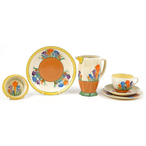 201 - Clarice Cliff, Art Deco Bizarre Crocus pattern china comprising jug, trio, bowl and dish, the larges... 