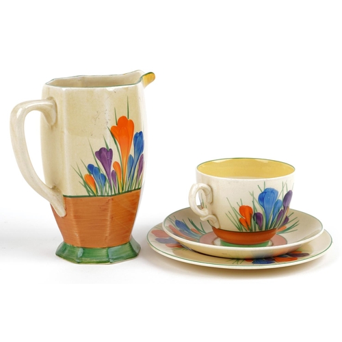 201 - Clarice Cliff, Art Deco Bizarre Crocus pattern china comprising jug, trio, bowl and dish, the larges... 