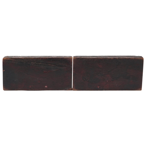 1199 - Pair of Chinese hardwood bookends carved with Buddha heads, each 23cm high