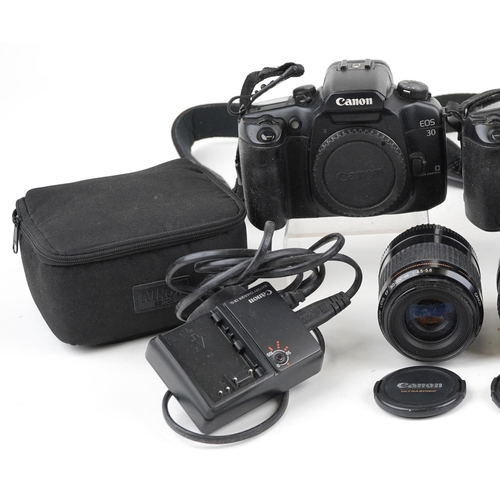 1337 - Vintage and later cameras and accessories including a Nikon D90 and two Canon EOS 30