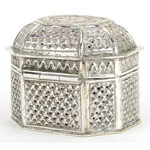 145 - Tibetan silver casket with hinged lid embossed with flowers and foliage, impressed marks to the base... 