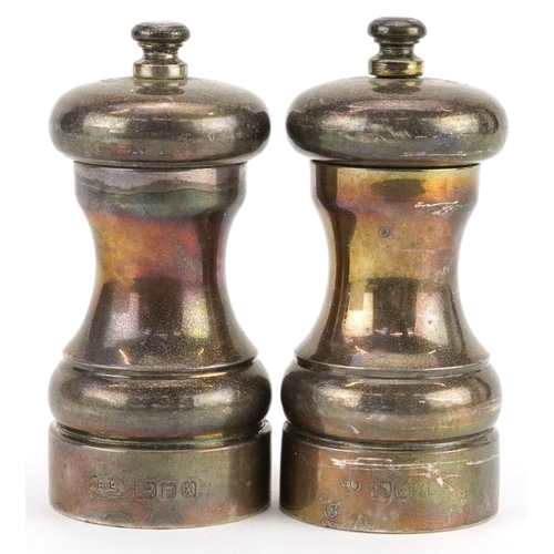 269 - John Bull Ltd, pair of Elizabeth II silver Peter Piper pepper mills, London 1997-98, 10cm high, 265.... 