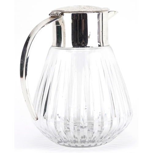 1198 - Modernist cut glass water jug with liner and silver plated mounts, 25cm high