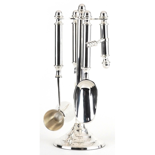 1284 - Novelty silver plated bar companion set on stand including corkscrew, 28cm high