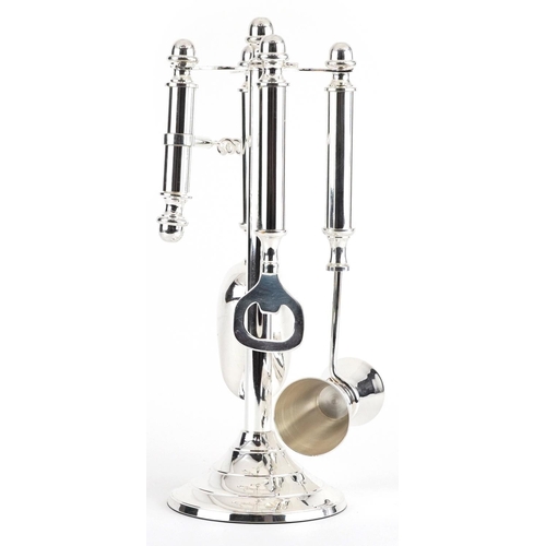 1284 - Novelty silver plated bar companion set on stand including corkscrew, 28cm high