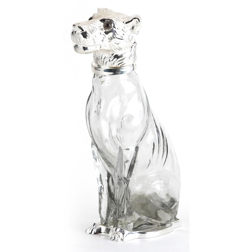 1310 - Novelty cut glass claret jug with silver plated mounts in the form of a dog, 24cm high