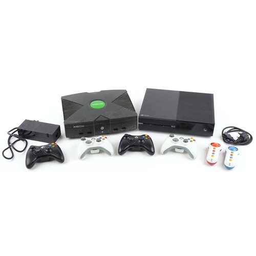 1391 - Xbox and Xbox One games consoles with four controllers and accessories