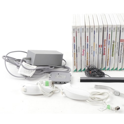 1388 - Nintendo Wii games console with controllers, accessories and a collection of games