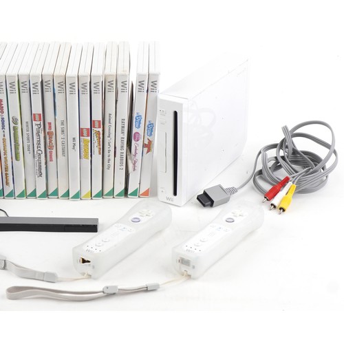 1388 - Nintendo Wii games console with controllers, accessories and a collection of games