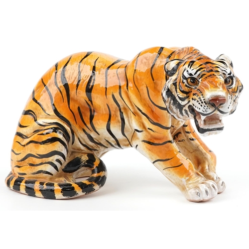 1305 - Large continental ceramic tiger, indistinct impressed marks to the base, 36cm in length