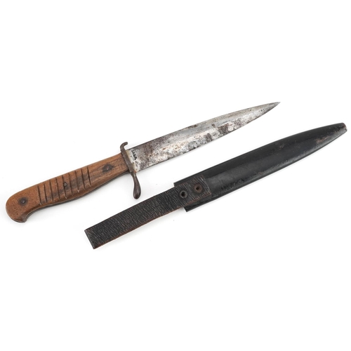 473 - German military interest boot knife with sheath, impressed marks to the steel blade, 27.5cm in lengt... 