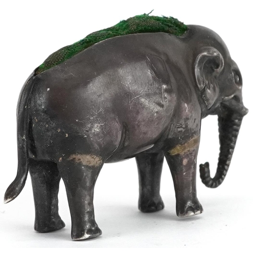 12 - Adie & Lovekin Ltd, George V novelty silver pin cushion in the form of an elephant, Birmingham 1922,... 