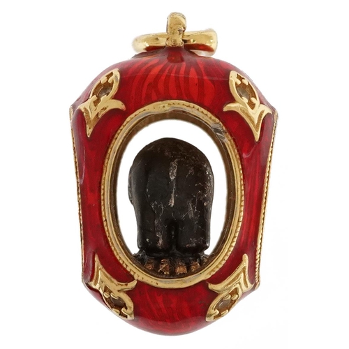 2610 - Silver gilt and guilloche enamel elephant egg pendant set with clear stones, 2.2cm high, 8.3g