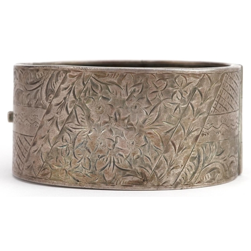 2761 - Large George V floral engraved hinged bangle, Birmingham 1933, 6.5cm wide x 3.2cm high, 42.8g