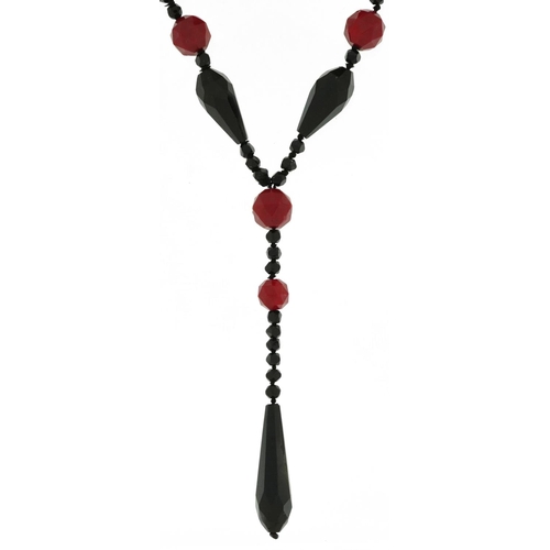 2655 - French Art Deco jet and red stone necklace, 82cm in length, 54.4g