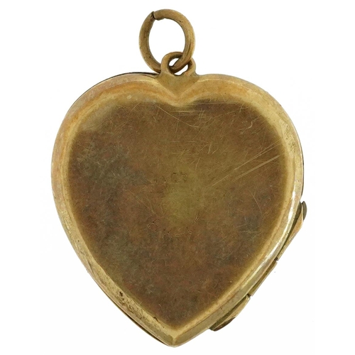 2171 - 9ct gold back and front engine turned love heart locket, 2.1cm high, 3.8g