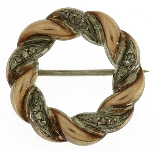 2141 - Antique unmarked two tone gold diamond wreath brooch, tests as 9ct gold, 2.4cm in diameter, 5.3g