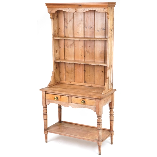 1022 - Victorian slim stripped pine dresser with open plate rack above two frieze drawers and under tier, 1... 