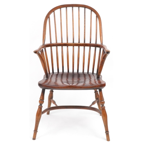 1005 - Antique elm Windsor chair with crinoline stretcher, 99cm high