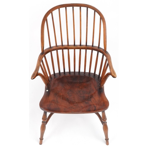 1005 - Antique elm Windsor chair with crinoline stretcher, 99cm high