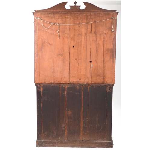 1075 - Victorian mahogany side cupboard with mirrored back above frieze drawer and pair of cupboard doors, ... 