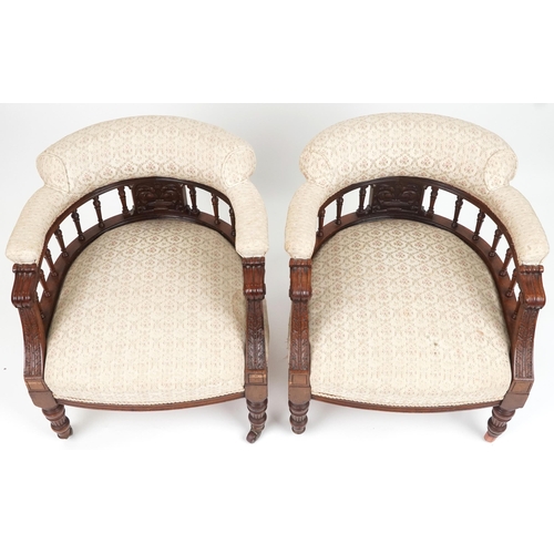 1039 - Pair of carved mahogany framed bedroom chairs with floral upholstery, 70cm high