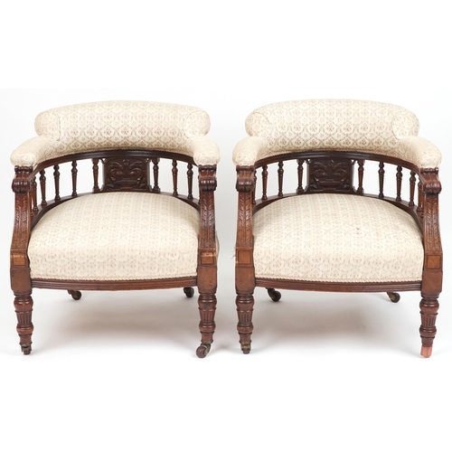 1039 - Pair of carved mahogany framed bedroom chairs with floral upholstery, 70cm high