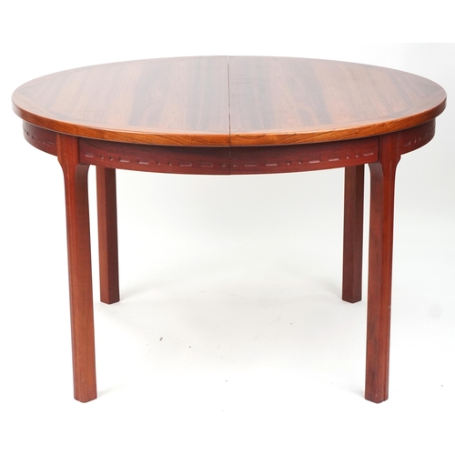 1001 - Bramin, Danish mid century rosewood circular extending dining table with two folding inserts and six... 