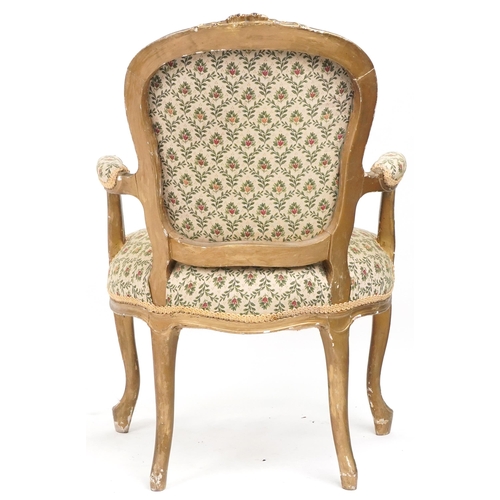 1045 - French gilt framed elbow chair with floral upholstery, 99cm high