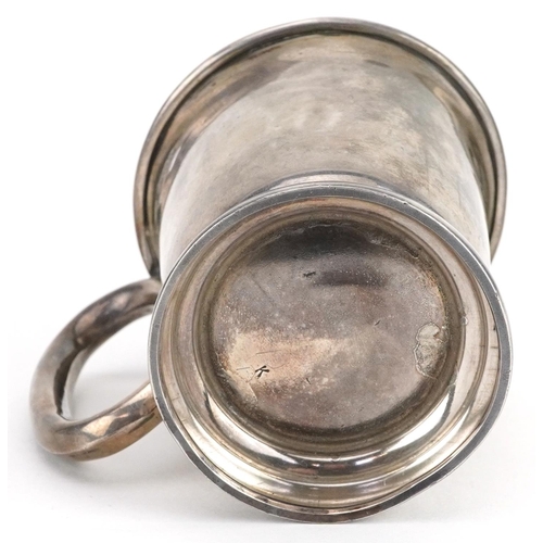 1166 - Silver christening tankard by Viner's and a silver compact in the form of a purse, the largest 7.5cm... 